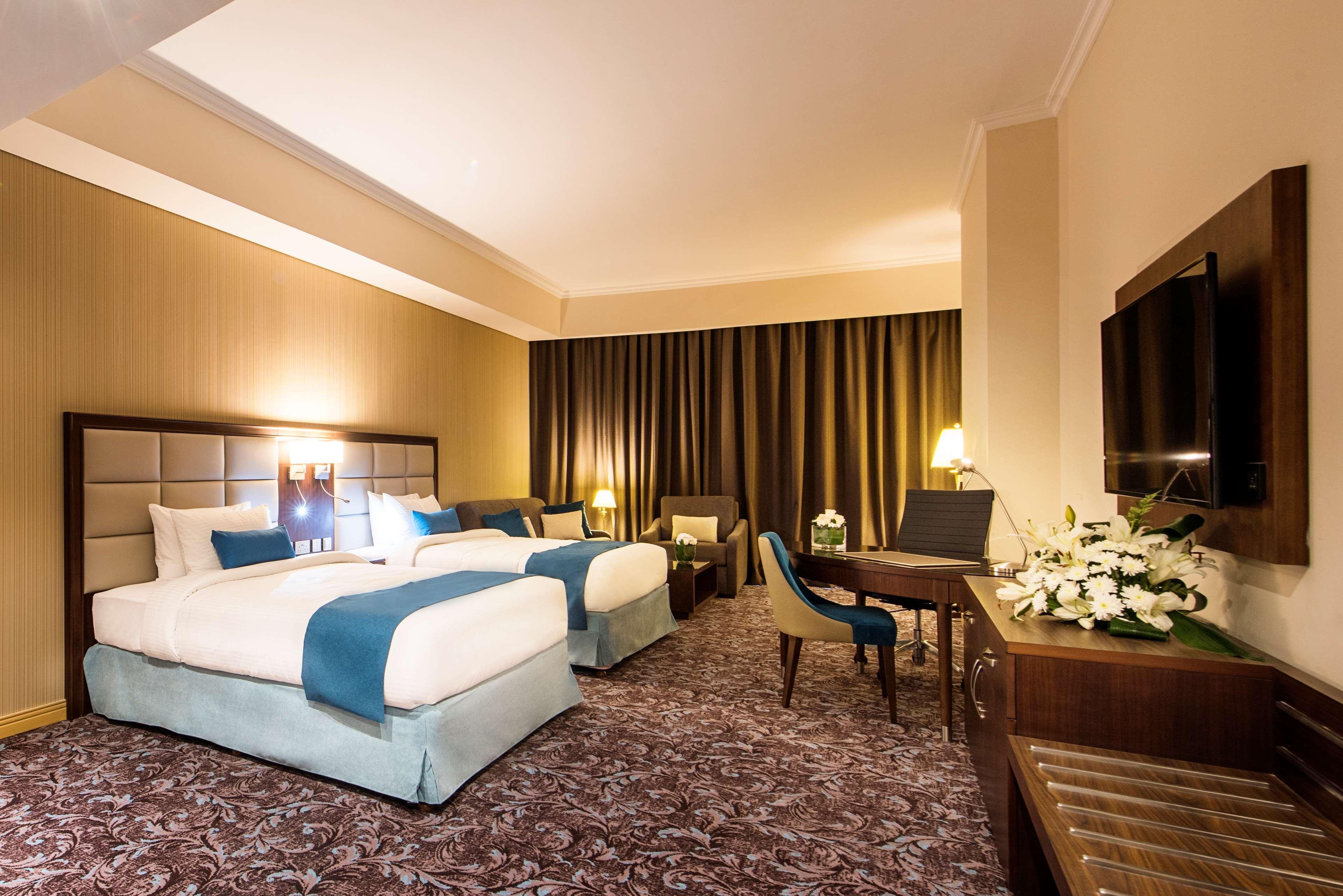 Golden Tulip Doha Hotel Exteriör bild Deluxe Room