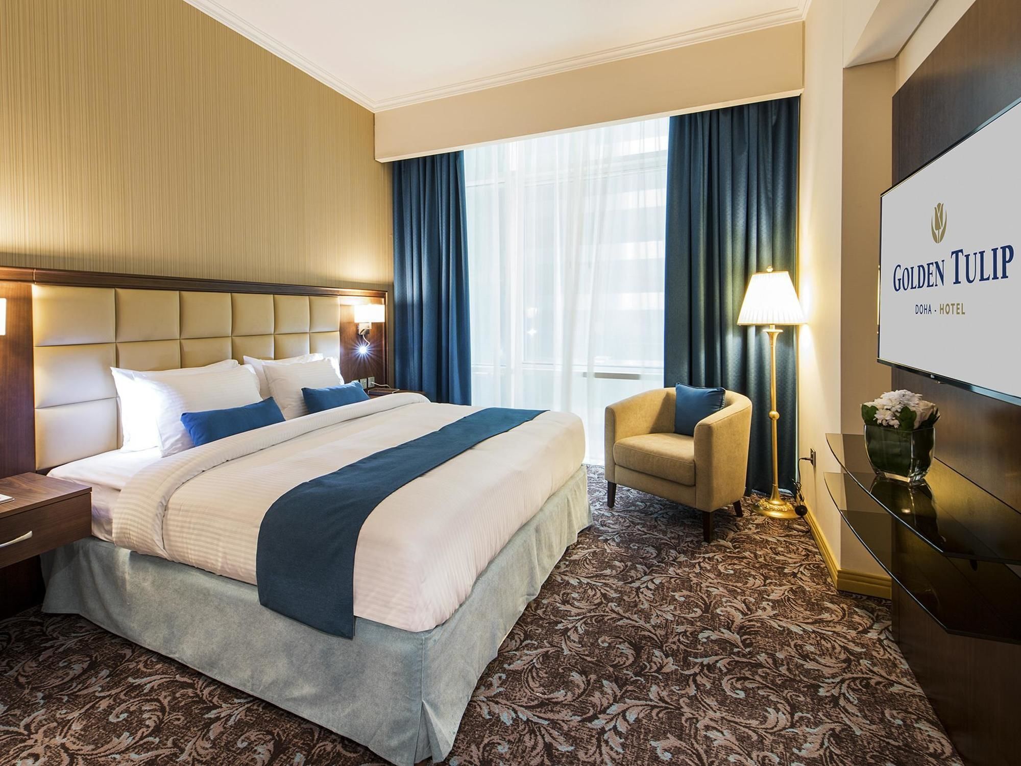 Golden Tulip Doha Hotel Exteriör bild Deluxe Room