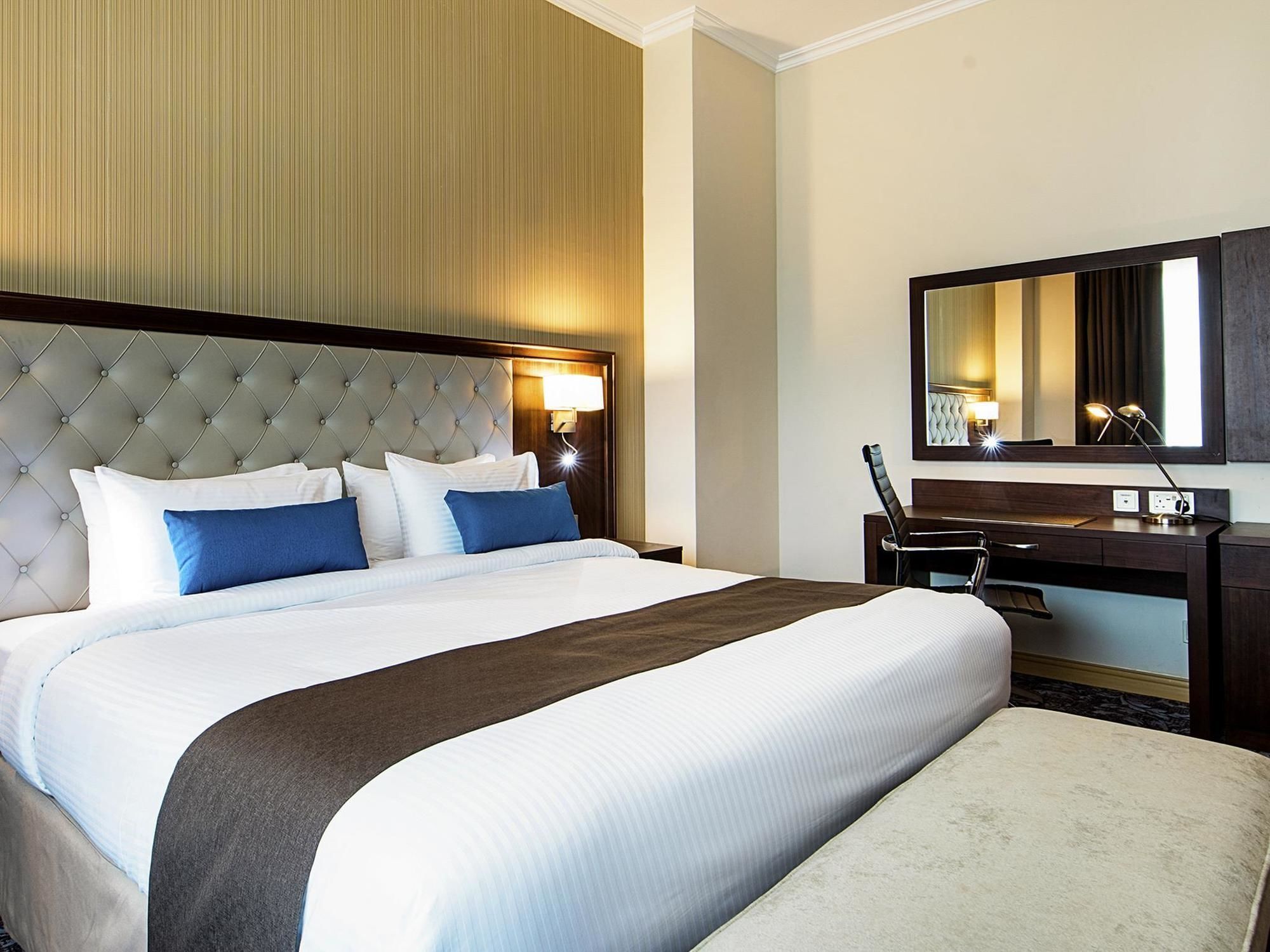 Golden Tulip Doha Hotel Exteriör bild Deluxe Room