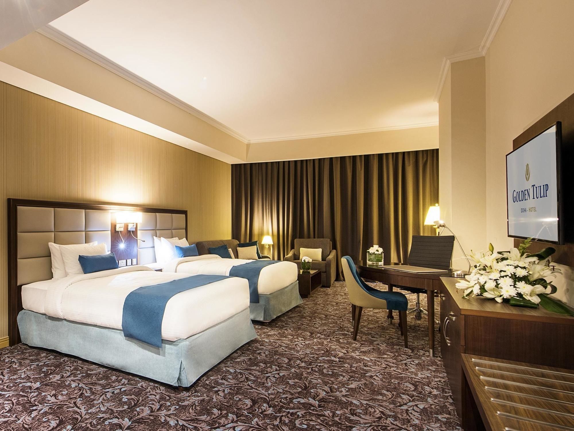Golden Tulip Doha Hotel Exteriör bild Deluxe Room
