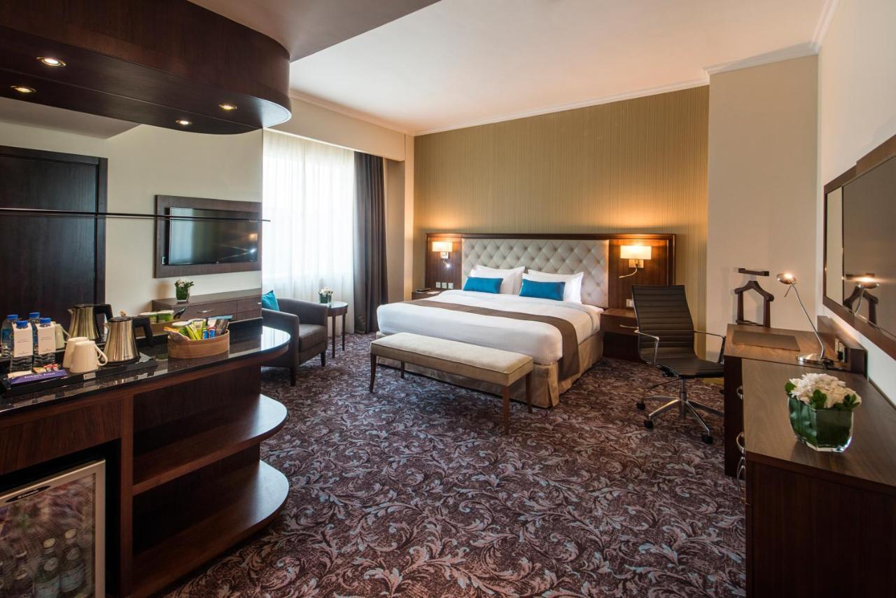 Golden Tulip Doha Hotel Exteriör bild Suite